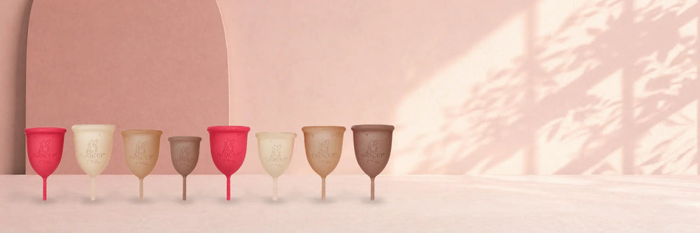 The four GIOCUP® kits: pairs of menstrual cups in two sizes in Agate, Amber, Pearl and Rose